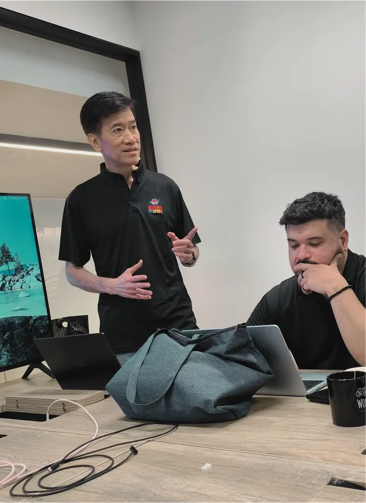 ShopNJoy team members collaborating around a table